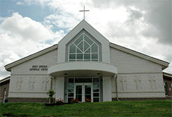 Sitting atop a hill on the grounds of Holy Angels Parish in Indianapolis, its new brick church&mdash;nine years in the making&mdash;is a testament to God&rsquo;s grace, parish leaders say. (Photo by John Shaughnessy)