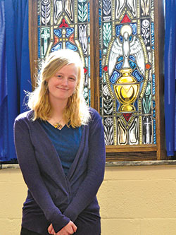 Katie Wesolowski, 28, who strives to live her life as a daughter of Christ, stands in the chapel of the Archbishop Edward T. O&rsquo;Meara Catholic Center in Indianapolis. (Photo by Natalie Hoefer)