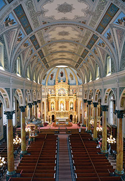 The sanctuary of St. Joseph Shrine in St. Louis boasts a three-tier &ldquo;Altar of Answered Prayers,&rdquo; the effort of parishioners in thanksgiving after a St. Joseph novena during a cholera epidemic in 1866. (Photo by Natalie Hoefer)