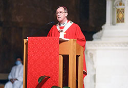 Archbishop Charles C. Thompson preaches a homily during an Oct. 17 Mass at SS. Peter and Paul Cathedral in Indianapolis that began the archdiocese&rsquo;s participation in the preparation for a 2023 meeting at the Vatican of the Synod of Bishops on synodality in the Church. (Photo by Sean Gallagher)