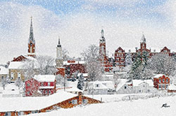Spires of Holy Family Church and of the Sisters of St. Francis&rsquo; convent and chapels pierce the skyline of Oldenburg. (Photo courtesy of Holidays Under the Spires)