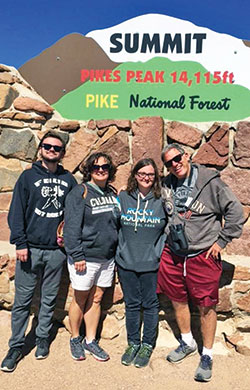 During a vacation in Colorado in 2019, the archdiocese&rsquo;s assistant superintendent of Catholic schools, Rob Rash, right, and his wife Patty, second from left, pose for a family picture with their son John and their daughter Katie. (Submitted photo)