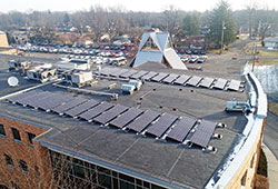 Recently installed solar panels sit on the roof of Cardinal Ritter Jr./Sr. High School in Indianapolis. In addition to reducing the school&rsquo;s carbon footprint and utility costs, the panels are being integrated into its science and theology lesson plans. (Submitted photo)