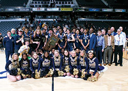 The boys&rsquo; basketball team of Cathedral High School in Indianapolis celebrates its state championship on March 26 at Gainbridge Fieldhouse in Indianapolis. (Submitted photo)