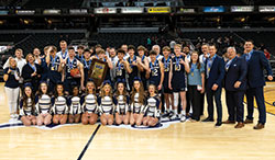 The boys&rsquo; basketball team of Our Lady of Providence High School in Clarksville celebrates its first state championship on March 26 at Gainbridge Fieldhouse in Indianapolis. (Photo courtesy of Charles Kraft)
