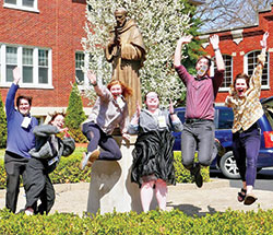 Young adults from the archdiocese show their joy&mdash;and their jumping ability&mdash;during a spontaneous moment at the archdiocesan young adult retreat on April 3, a weekend retreat that took place at the Mount Saint Francis Center for Spirituality in southern Indiana. The group includes Brendan White, left, Anna Jirgal, Emily Burnham, Taylor Morrone, Matt Morrone and Emily Mastronicola. (Submitted photo)