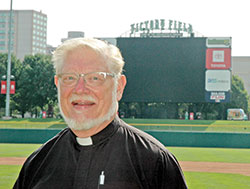 Victory Field in Indianapolis will be the backdrop for Father Rick Ginther as he sings the National Anthem before the Indianapolis Indians&rsquo; game on August 4. (Photo by John Shaughnessy)