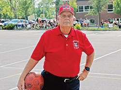 One of Mike LaGrave&rsquo;s greatest joys in 50 years as an umpire is working kickball games for the archdiocese&rsquo;s Catholic Youth Organization. (Photo by John Shaughnessy)