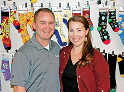 Scott and Elisabeth Williams strive to keep a leg up on everyone with their business, Sock Religious, &ldquo;the world&rsquo;s largest Catholic sock company.&rdquo; (Photo by John Shaughnessy)