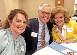 Andi Byrne, left, and her parents, Pat and Brenda Byrne, enjoy each other&rsquo;s company during the Oct. 6 United Catholic Appeal dinner at St. Mary of the Knobs Parish in Floyd County, where they all are members. (Submitted photo by Leslie Lynch)