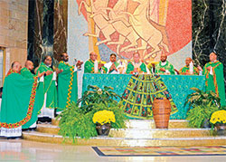 Priests from across the country concelebrate with Archbishop Charles C. Thompson on Oct. 15 in St. Rita Church in Indianapolis during the closing Mass of the National Black Catholic Men&rsquo;s Conference. (Photo by Natalie Hoefer)