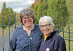 The friendship between Benedictine Sister Susan Reuber, left, and Sister Mary Luke Jones reflects one of the defining qualities of Our Lady of Grace Monastery in Beech Grove&mdash;the tight bonds that connect sisters across the generations. (Photo by John Shaughnessy)
