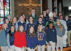 Archbishop Charles C. Thompson joins the seniors of Seton Catholic High School in Richmond for a photo following the archbishop&rsquo;s annual Mass with high school seniors from Catholic schools across the archdiocese on Oct. 26 at St. Malachy Church in Brownsburg. (Photo by John Shaughnessy)