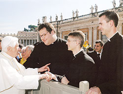 Pope Benedict XVI greets then deacon candidates Sean Danda, center, from St. Malachy Parish in Brownsburg, Nicholas Vaskov, left, of the Diocese of Pittsburgh, and Jesse Burish, right, of the Diocese of LaCrosse, Wis., in St. Peter&rsquo;s Square in Rome in 2008. The seminarians received priestly formation at the Pontifical North American College in Rome. (Submitted photo/L&rsquo;Osservatore Romano)