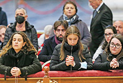 People pay their respects at the body of Pope Benedict XVI in St. Peter&rsquo;s Basilica at the Vatican on Jan. 3. (CNS photo/Paul Haring)