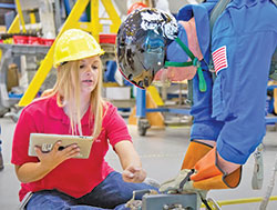 Known as the &ldquo;Professor of Spacewalking,&rdquo; Allissa Battocletti Noffke helps train an astronaut in using the tools that are needed during a space mission. (Submitted photo)