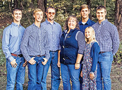 Indiana&rsquo;s Choice Scholarships, commonly known as vouchers, have helped the five children of the Hoff family, members of St. Nicholas Parish in Ripley County, receive a Catholic education. David and Michelle Hoff, third and fourth from left, are the parents of Nicholas, left, Zachary, Jacob, Holly and Michael Hoff. (Submitted photo)