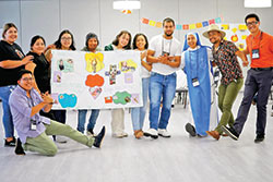 As part of an exercise, participants at the Fe y Vida (Faith and Life) Institute at Lewis University in Romeoville, Ill., in June were separated into groups outside their diocese or archdiocese. Pictured at far right in an orange polo shirt is Jose Quintana of St. Patrick Parish in Indianapolis, a member of the archdiocese&rsquo;s Pastoral Juvenil Leadership Team. He is also a sub-leader of the group. (Submitted photo)
