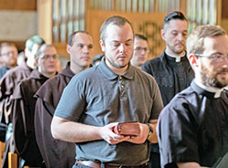 Seminarian Aidan Hauersper prays Morning Prayer on May 4 in the St. Thomas Aquinas Chapel at Saint Meinrad Seminary and School of Theology in St. Meinrad. A member of St. Joseph Parish in Jennings County, Hauersperger took part in the last academic year in Saint Meinrad&rsquo;s new propaedeutic program for new seminarians. (Photo courtesy of Saint Meinrad Archabbey)