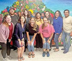 Members of St. Michael Parish in Charlestown pose during an Aug. 16 bilingual catechist workshop at St. Mary Parish in New Albany. They are, from left in the front row, Laura Kinder, Jessica Sarver, Jennie Lathem and Christina Smith. From left in the second row, Nick Smith, Haley Cady, Abigail Martinez, Evangelina Delgado Veliz, Luz Elena Ni&ntilde;o-Melchor and Gerardo Pascual. (Submitted photo)