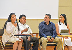 Mercedes Ahuatl, left, answers a question about Natural Family Planning (NFP) during a conference at the Archbishop Edward T. O&rsquo;Meara Catholic Center in Indianapolis on July 29. Her husband Gaspar Xochitlatoa, second from left, and NFP panel discussion moderators Jose Rivas and Lilia Lua listen to her response. (Photo by Natalie Hoefer)