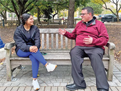 Father James Brockmeier, chaplain to the Catholic students of Butler University in Indianapolis, speaks with Butler student Stephanie Gonzalez on Oct. 25 on Butler&rsquo;s campus. (Submitted photo)