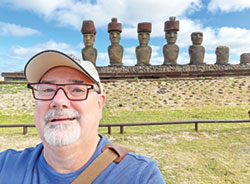 To develop its &ldquo;Sacred Places&rdquo; exhibit, staff members of The Children&rsquo;s Museum of Indianapolis traveled to different parts of the world to understand young people&rsquo;s religious and spiritual beliefs. Chris Carron, the museum&rsquo;s director of collections, visited Rapa Nui, Chile, to understand more about the stone statues, called moai, that represent ancestors and their importance in the spiritual traditions and daily life of this Pacific Island community, which is also known as Easter Island. (Photo courtesy of The Children&rsquo;s Museum)