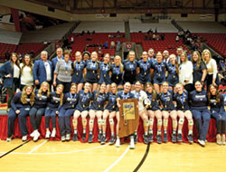 Players and coaches of the girls&rsquo; volleyball program of Our Lady of Providence High School in Clarksville are joined by school officials in posing for a celebratory photo after winning Indiana&rsquo;s Class 3A state championship in the sport on Nov. 4 at Ball State University in Muncie, Ind. (Submitted photo)