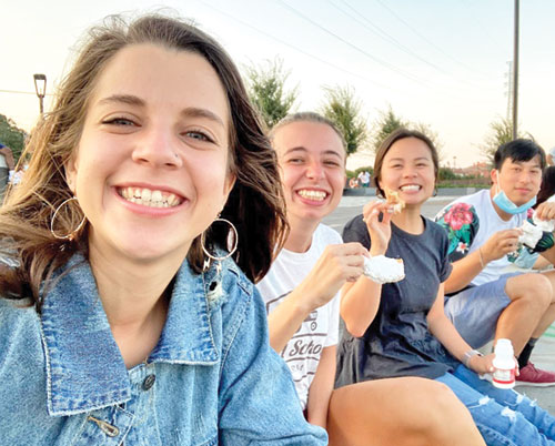 Meagan Morrisey, left, the current director of the archdiocese&rsquo;s young adult and college campus ministry, shares a moment of joy with students at Tulane University in New Orleans while she served there as a FOCUS (Fellowship of Catholic University Students) missionary from 2018-21. (Submitted photo)
