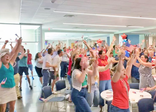 In a &ldquo;watch party&rdquo; at Cathedral High School in Indianapolis on August 6, fans celebrate the gold-medal victory of Cole Hocker, a 2019 Cathedral grad, in the 1500-meter run in the 2024 Olympics in Paris. (Submitted photo)