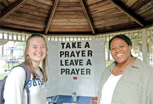 As the campus minister of the Catholic community at Butler University in Indianapolis, Cheyenne Johnson, right, has helped deepen the faith of the college&rsquo;s Catholic students, including Ellie Cornn, a senior from St. Ambrose Parish in Seymour. (Photo by John Shaughnessy)