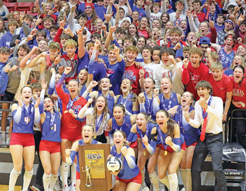 Classmates, friends, family and fans of the girls&rsquo; volleyball team of Roncalli High School in Indianapolis join in the celebration with the members of the team shortly after it won Indiana&rsquo;s Class 3A state championship on Nov. 9. (Submitted photo)
