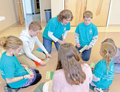 Janine Schorsch strives to share her faith&mdash;and touches of hope&mdash;as a faith formation teacher for children at St. Teresa Benedicta of the Cross Parish in Bright. (Submitted photo)
