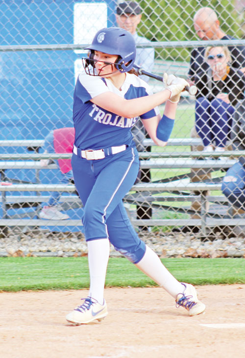 Anni Felts, a senior at Bishop Chatard High School in Indianapolis, swings at a pitch as a member of her school&rsquo;s softball team. The school seeks to put faith at the heart of its 28 boys&rsquo; and girls&rsquo; athletic teams, in which some 75% of its students participate. (Submitted photo)