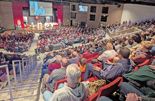 Some 1,500 men taking part in the 10th annual E6 Catholic Men&rsquo;s Conference on Feb. 22 at East Central High School in St. Leon listen to Father Jonathan Meyer preach during the event&rsquo;s Mass. (Photo by Sean Gallagher) 