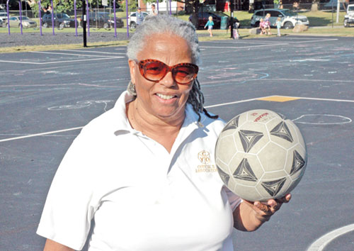 For more than 40 years, Rachel Mitchum has been a kickball umpire in the archdiocese&rsquo;s Catholic Youth Organization, adding fun and sharing lessons in life with the girls who play the sport. (Photo by John Shaughnessy)