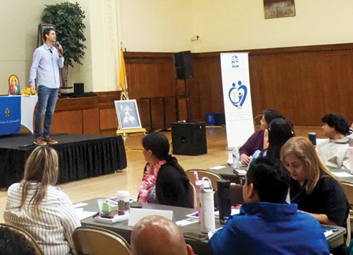 International speaker Evan Lemoine addresses participants during the &ldquo;Heal to Love&rdquo; conference for Latinos at the Archbishop Edward T. O&rsquo;Meara Catholic Center in Indianapolis on July 19. (Submitted photo)