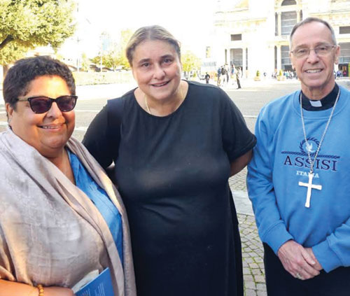 Archbishop Charles C. Thompson is pictured with Marilyn Santos, left, associate director of the Secretariat of Evangelization and Catechesis for the U.S. Conference of Catholic Bishops, and Antonia&nbsp;Salzano, St. Carlo Acutis&rsquo; mother, during a pilgrimage stop in Assisi, Italy. (Submitted photo courtesy of Marilyn Santos)