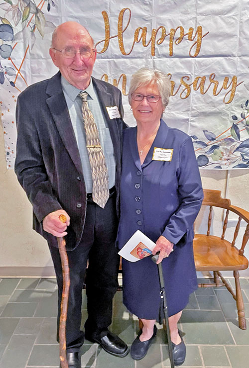 Bill and Eva Guillaume of Holy Cross Parish in St. Croix pose at a reception at St. Paul Parish in Tell City following a special Mass last October celebrated by Archbishop Charles C. Thompson for couples of the Tell City Deanery married for 50 or more years. The Guillaumes have been married for 69 years. (Submitted photo)