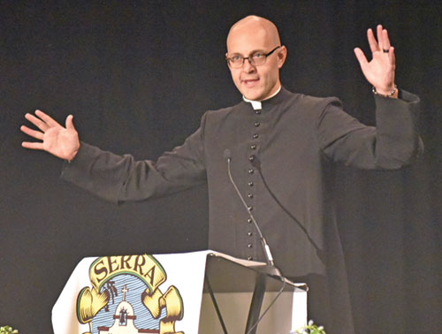 Father Michael Keucher, archdiocesan vocations director, gives a presentation on July 10 at the annual convention of Serra Internation held in Indianapolis. (Photo by Sean Gallagher)