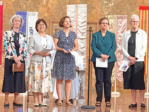 The new members of the leadership team of the Sisters of Providence of Saint Mary-of-the-Woods stand on Sept. 5 in the sanctuary of the congregation&rsquo;s church on the grounds of its motherhouse in St. Mary-of-the-Woods after being installed in their leadership positions. The are, from left, Providence Sister Jeanne Hagelskamp, Providence Sister Noreen Wu, Providence Sister Tracey Horan, Providence Sister Anne Therese Falkenstein and Providence Sister Lisa Stallings. (Photo courtesy of the Sisters of Providence)