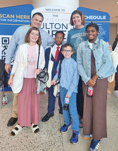 Craig and Natalie Wenzel pose on Sept. 24 with their children, Gianna, left, Fulton, Dominic and Teresa in St. Louis for the beatification of Blessed Fulton J. Sheen. (Submitted photo)