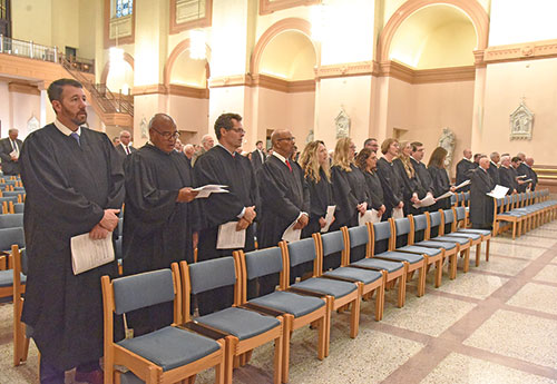 Wearing their courtroom robes, judges who serve in central Indiana at the federal, state and local levels take part on Oct. 6 in the annual Red Mass of the St. Thomas More Society of Central Indiana celebrated at SS. Peter and Paul Cathedral in Indianapolis. (Photos by Sean Gallagher)