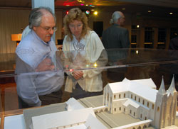 Parishioners Felix and Laurel Gorney look over the models unveiled for St. John Vianney Parish in Fishers on April 19. &ldquo;You couldn&rsquo;t ask for more in a church,&rdquo; Felix Gorney said of the plans. (Photo by Caroline B. Mooney)