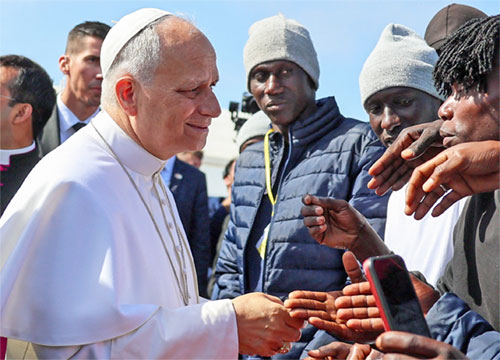 Pope Leo XIV greets migrants at the "Las Raices" migrant center in San Cristobal de La Laguna, Tenerife, Canary Islands, Spain, June 12, 2026, where he is meeting migrants and humanitarian organizations, as part of a seven-day apostolic journey to Spain, with visits to Madrid, Barcelona and the Canary Islands. (OSV News photo/Yara Nardi)